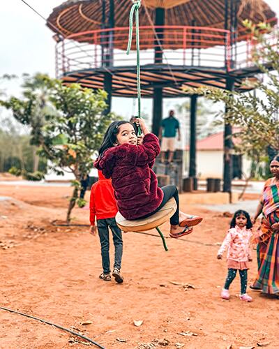 Childrens enjoying a thrilling zipline adventure at Go Ranch Resort.