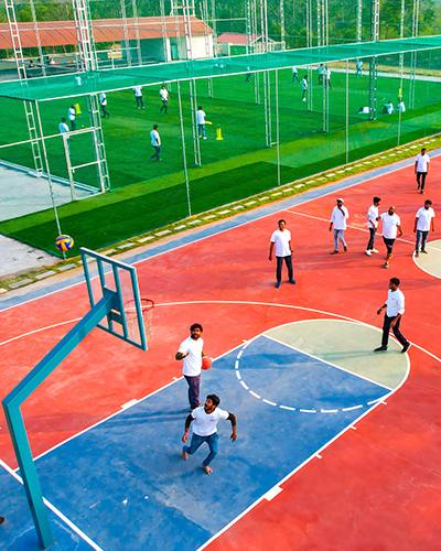 Guests playing basketball at Go Ranch Resort.