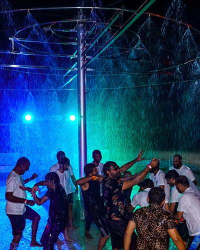 People performing traditional rain dance at Go Ranch Resort.